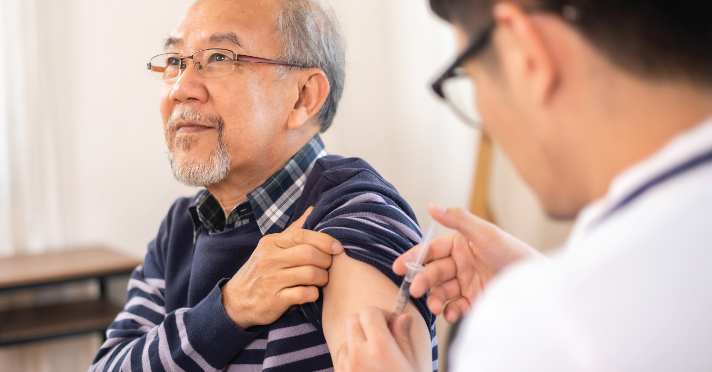 medicare-aged person receiving the shingles vaccine shot