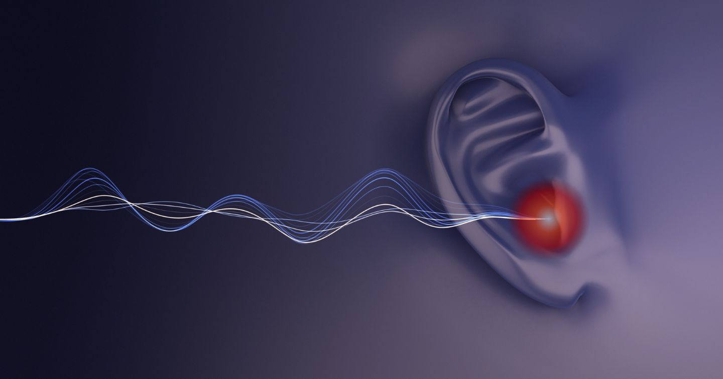 hearing loss concept showing sound waves entering ear and trouble hearing